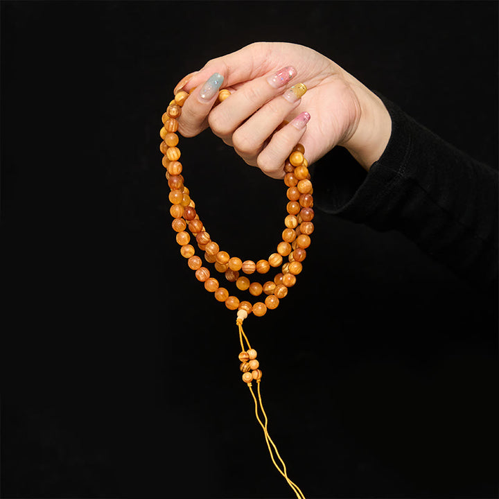 Buddha Stones Mala aus 108 harzreichen Kiefernholzperlen für beruhigende Energie - image 4
