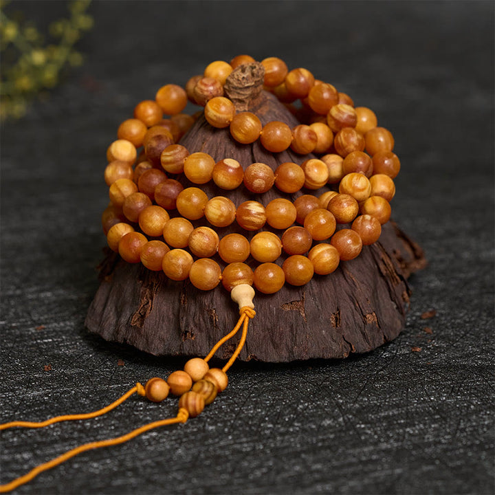 Buddha Stones Mala aus 108 harzreichen Kiefernholzperlen für beruhigende Energie - image 2
