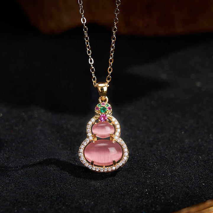 Buddha Stones Halskettenanhänger aus rosa Chalcedon-Kürbis mit Optimismus-Motiv - image 2
