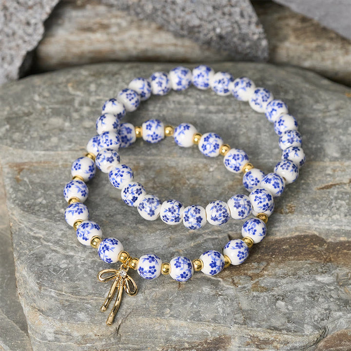 Buddha Stones Armband aus blau-weiß-rosa Porzellanperlen mit Schleife und innerem Frieden - image 2