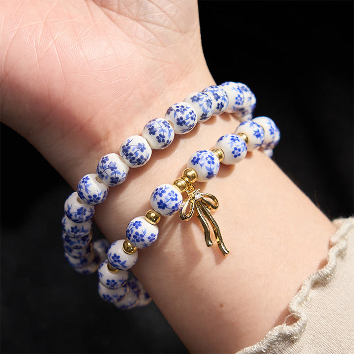 Buddha Stones Armband aus blau-weiß-rosa Porzellanperlen mit Schleife und innerem Frieden - image 3