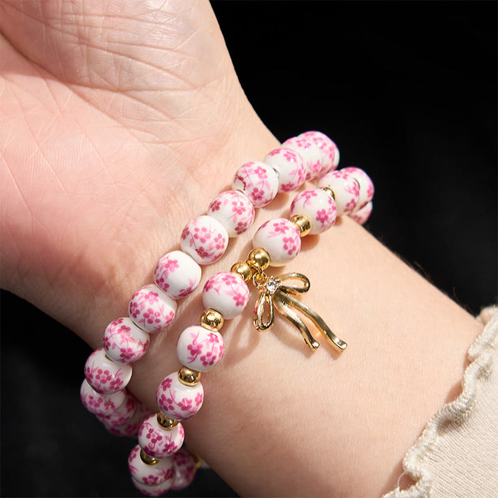 Buddha Stones Armband aus blau-weiß-rosa Porzellanperlen mit Schleife und innerem Frieden - image 9