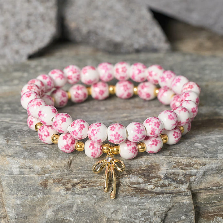 Buddha Stones Armband aus blau-weiß-rosa Porzellanperlen mit Schleife und innerem Frieden - image 7