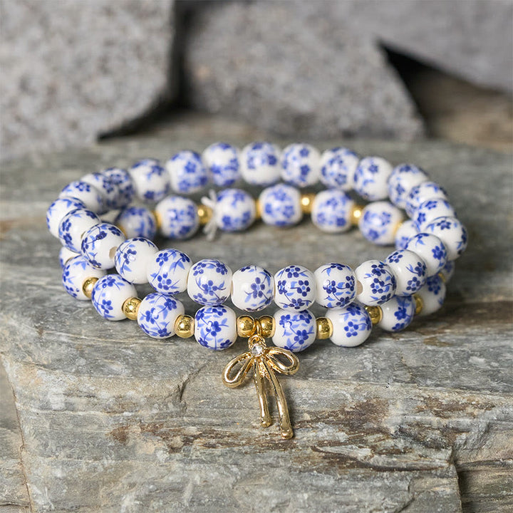 Buddha Stones Armband aus blau-weiß-rosa Porzellanperlen mit Schleife und innerem Frieden - image 1