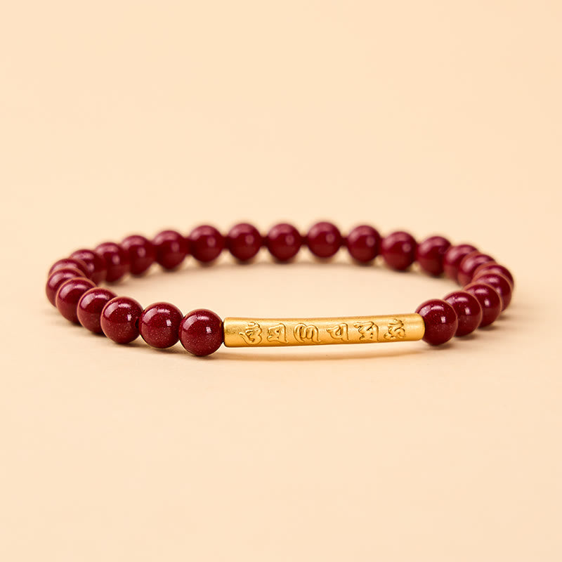 Buddha Stones Armband aus Zinnober und 999er Sterlingsilber mit Om-Mani-Padme-Hum-Weisheitssymbolen - Zinnobergold (Handgelenkumfang: 14–15 cm) - image 0