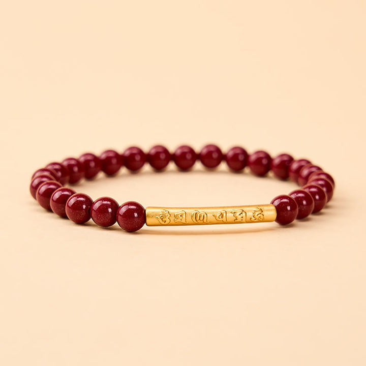 Buddha Stones Armband aus Zinnober und 999er Sterlingsilber mit Om-Mani-Padme-Hum-Weisheitssymbolen - Zinnobergold (Handgelenkumfang: 14–15 cm) - image 0