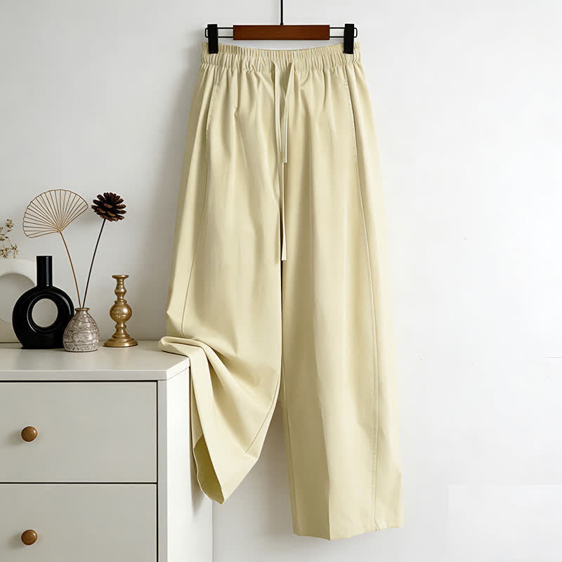 Buddha Stones Minimalistische, einfarbige Damen-Sommerhose mit weitem Bein, Kordelzug und Taschen - image 1