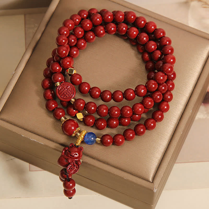 Buddha Stones Tibetische Glücks-Mala mit 108 Perlen aus Zinnober und Katzenmotiv - image 1