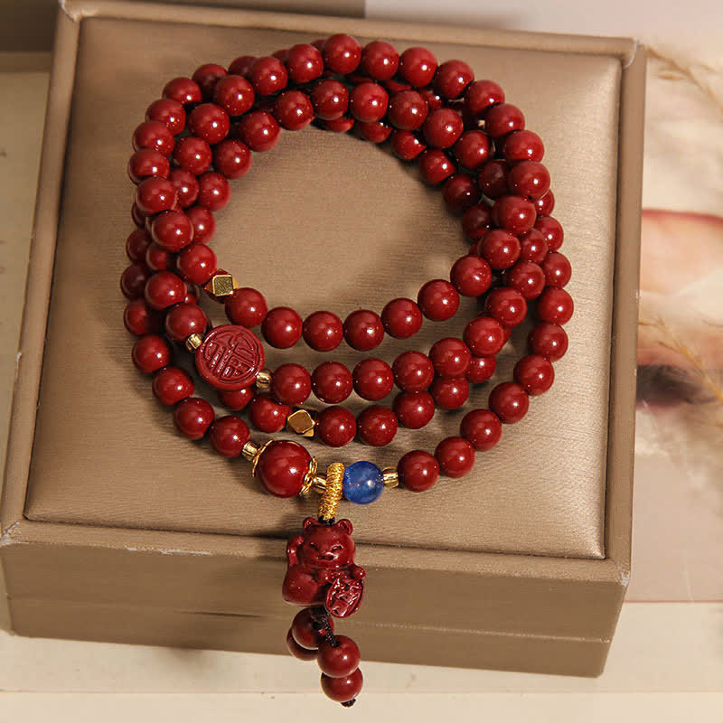 Buddha Stones Tibetische Glücks-Mala mit 108 Perlen aus Zinnober und Katzenmotiv - image 3