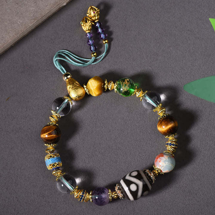 Buddha Stones Natürliches Dzi-Perlen-Armband aus Amethyst und Tigerauge - Dzi-Perlen (Handgelenkumfang: 16–17 cm) - image 0