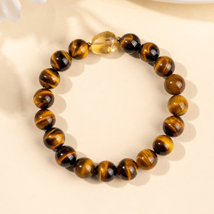 Buddha Stones 10 mm natürliches Tigeraugen-Citrin-Armband mit Mut-Symbol - image 3