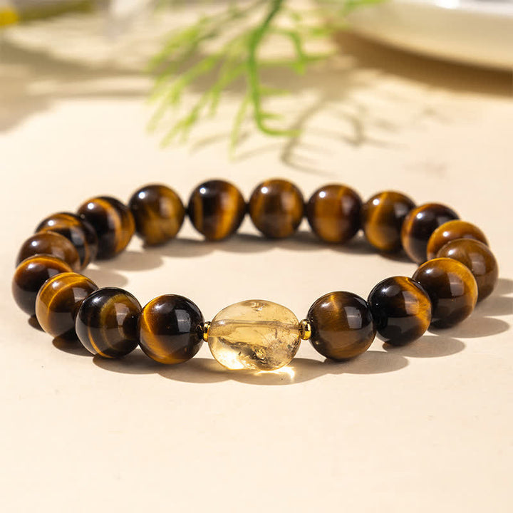 Buddha Stones 10 mm natürliches Tigeraugen-Citrin-Armband mit Mut-Symbol - Tigerauge (Handgelenkumfang: 16–17 cm) - image 0