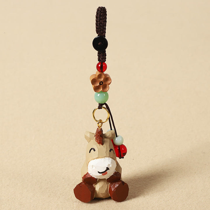 Buddha Stones Chinesischer Tierkreiszeichen-Schlüsselanhänger aus Lindenholz mit gravierter Pflaumenblüte – Frieden, Sicherheit, Om, Mani, Padme, Hum, Positiv - Pferd 4 cm (Farbe, Form und Größe können variieren) - Pflaumenblüte - image 1