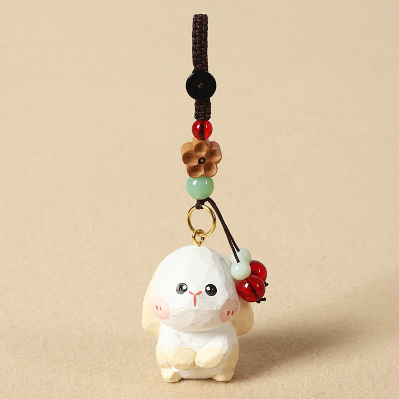 Buddha Stones Chinesischer Tierkreiszeichen-Schlüsselanhänger aus Lindenholz mit gravierter Pflaumenblüte – Frieden, Sicherheit, Om, Mani, Padme, Hum, Positiv - Kaninchen 4 cm (Farbe, Form und Größe können variieren) - Pflaumenblüte - image 17