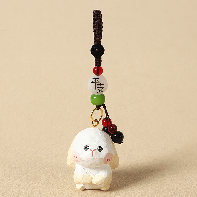 Buddha Stones Chinesischer Tierkreiszeichen-Schlüsselanhänger aus Lindenholz mit gravierter Pflaumenblüte – Frieden, Sicherheit, Om, Mani, Padme, Hum, Positiv - Kaninchen 4 cm (Farbe, Form und Größe können variieren) - Frieden und Sicherheit - image 18
