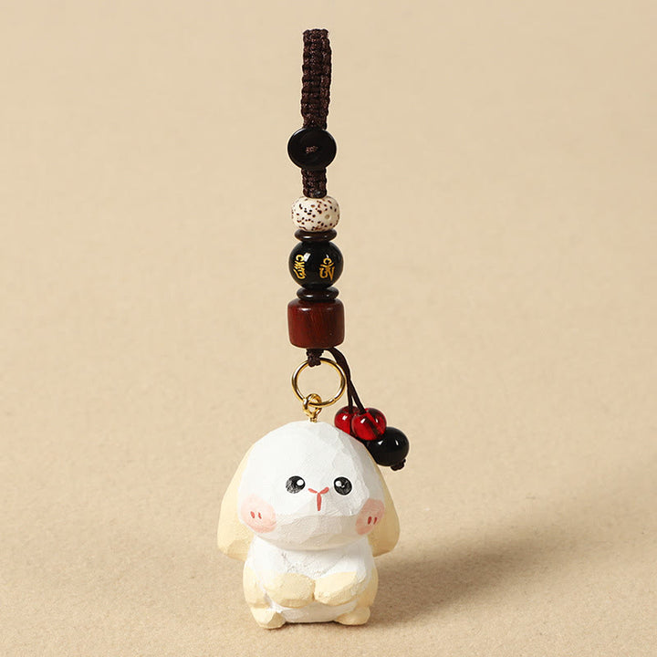 Buddha Stones Chinesischer Tierkreiszeichen-Schlüsselanhänger aus Lindenholz mit gravierter Pflaumenblüte – Frieden, Sicherheit, Om, Mani, Padme, Hum, Positiv - Kaninchen 4 cm (Farbe, Form und Größe können variieren) - Om Mani Padme Hum - image 16