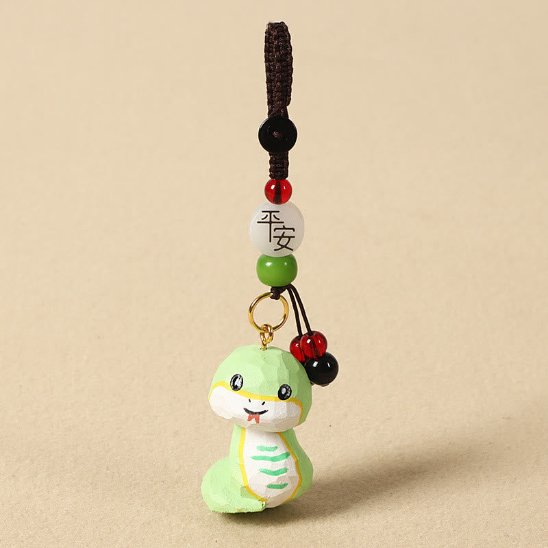 Buddha Stones Chinesischer Tierkreiszeichen-Schlüsselanhänger aus Lindenholz mit gravierter Pflaumenblüte – Frieden, Sicherheit, Om, Mani, Padme, Hum, Positiv - Schlange 4 cm (Farbe, Form und Größe können variieren) - Frieden und Sicherheit - image 25