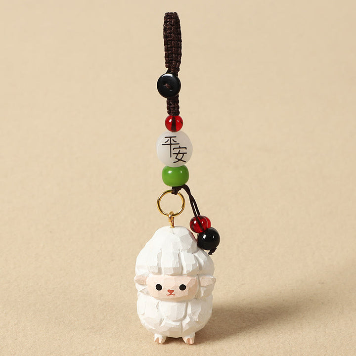 Buddha Stones Chinesischer Tierkreiszeichen-Schlüsselanhänger aus Lindenholz mit gravierter Pflaumenblüte – Frieden, Sicherheit, Om, Mani, Padme, Hum, Positiv - Ziege 4 cm (Farbe, Form und Größe können variieren) - Frieden und Sicherheit - image 28