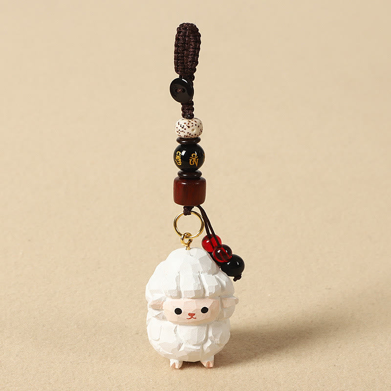 Buddha Stones Chinesischer Tierkreiszeichen-Schlüsselanhänger aus Lindenholz mit gravierter Pflaumenblüte – Frieden, Sicherheit, Om, Mani, Padme, Hum, Positiv - Ziege 4 cm (Farbe, Form und Größe können variieren) - Om Mani Padme Hum - image 0