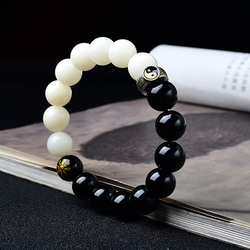 Buddha Stones Armband aus schwarzem Obsidian, Bodhi-Samen, Yin-Yang-Mantra mit neun Zeichen, Berggeister-Motiv, Geld ausgeben, Stärke - image 1