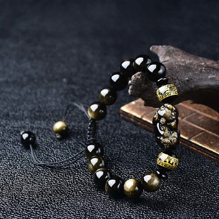 Buddha Stones Armband aus natürlichem, goldglänzendem Obsidian mit PiXiu Om Mani Padme Hum Schutzseil - 10 mm (Handgelenkumfang: 16-17 cm) - image 0