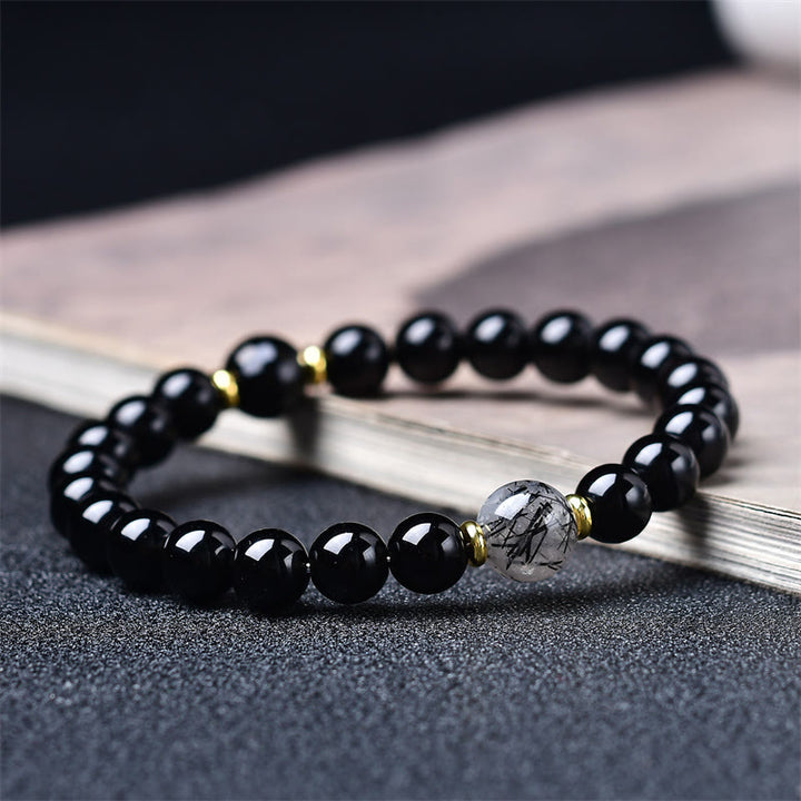 Buddha Stones Natürliches schwarzes Obsidian- und Rutilquarz-Reinigungsarmband - 10 mm (Handgelenkumfang: 16-17 cm) - image 0