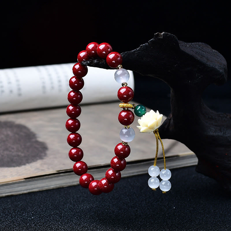 Buddha Stones Natürliches Armband mit Zinnober, Katzenaugen-Elfenbein, Lotus-Fruchtanhänger und Segenssymbol - image 1