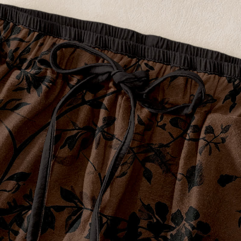 Buddha Stones Schwarze Damenhose aus reiner Baumwolle mit botanischem Blattmuster, elastischem Bund und Taschen - image 1