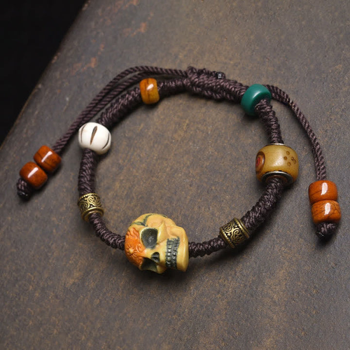 Buddha Stones Knochen – Der Herr des Leichenwaldes – Armband zum Schutz vor bösen Geistern - Braunes Seil (Handgelenkumfang: 17-23 cm) - image 0