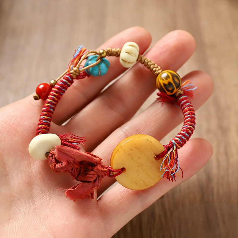Buddha Stones Friedensarmband mit Knochen-Fu-Motiv - image 1