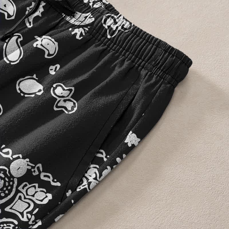 Buddha Stones Herrenhose aus Baumwolle mit schwarz-weißem Paisley-Patchworkmuster, schmal zulaufend und mit Taschen - image 2