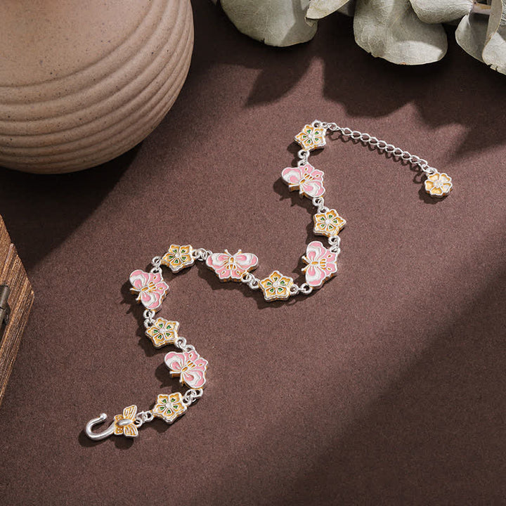 Buddha Stones Armband aus Kupfer-Emaille mit Schmetterlings- und Blumenmotiv - image 2