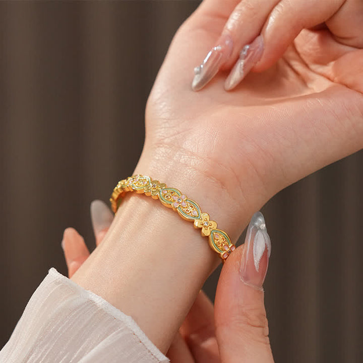 Buddha Stones Armreif aus Kupferemaille mit floralem Muster und Balance-Motiv - image 7