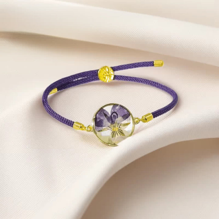 Buddha Stones Handgefertigtes, verstellbares Armband aus geflochtenem Seil mit Geburtsblume aus Kunstharz - Violett (Handgelenkumfang: 17–22 cm) - image 0