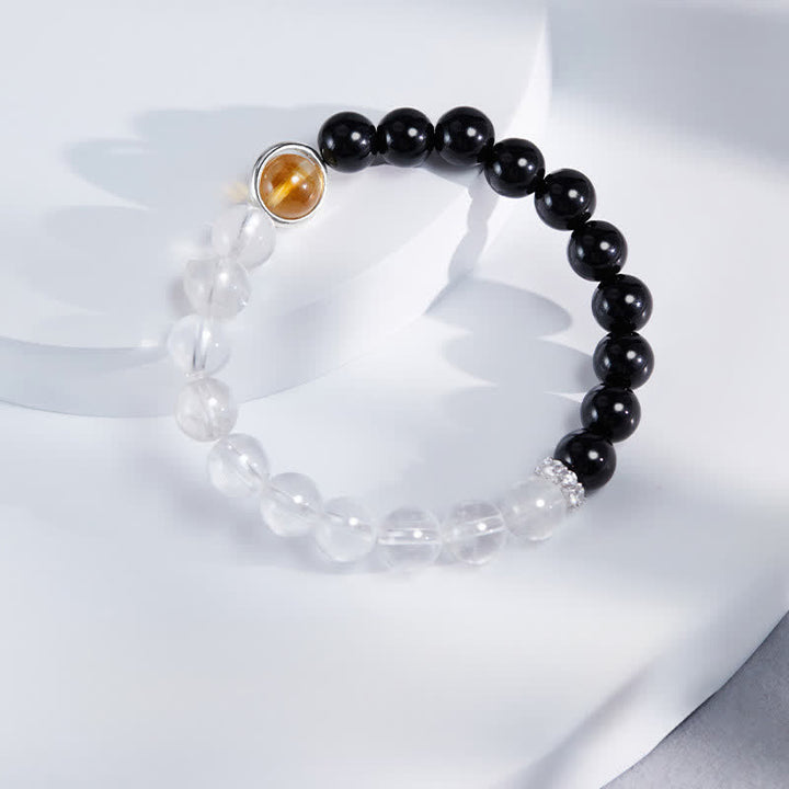 Buddha Stones Schutzarmband aus klarem Quarz und schwarzem Obsidian - image 1