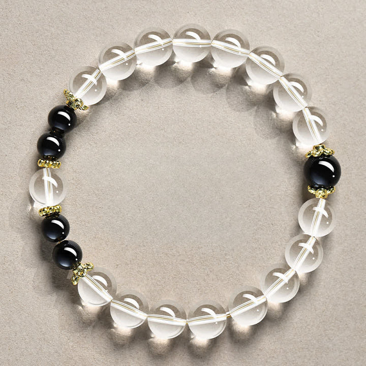 Buddha Stones Heilendes Armband aus natürlichen, klaren Quarzperlen - 8 mm klarer Quarz, schwarzer Obsidian (Handgelenkumfang: 15–16 cm) - image 0