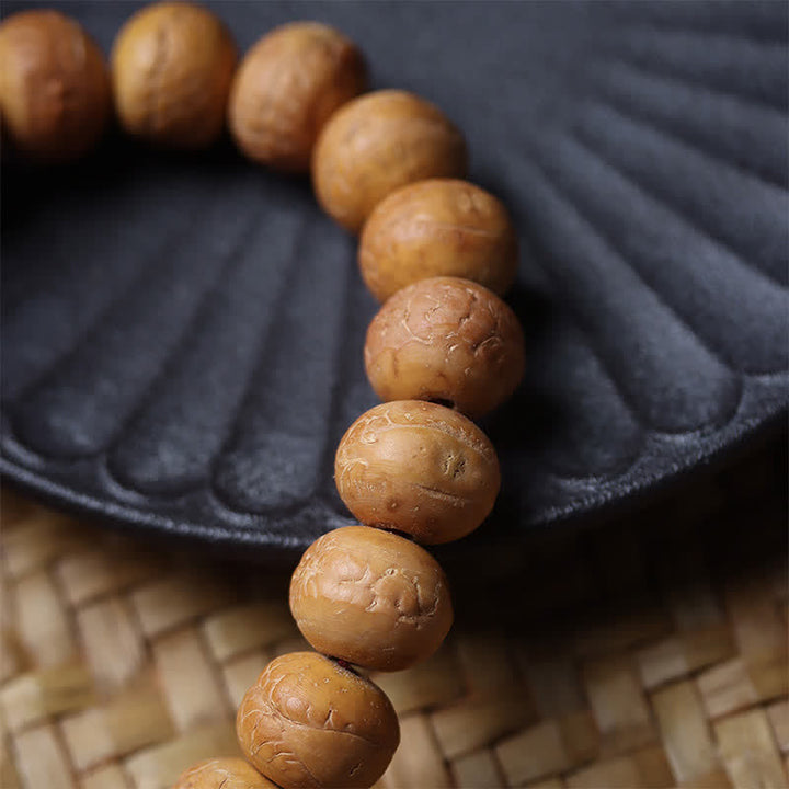 Buddha Stones Phönixauge Bodhi Weisheit Tibetische gravierte Quasten-Armband-Mala - image 9