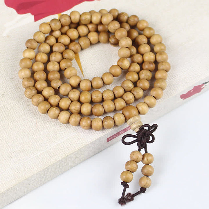 Buddha Stones Pfirsichholz-Mala, handpoliert, geknotet, 108 Perlen - 6 mm - Normal - Pfirsichholz (Schutz ♥ Reinigung) - image 0
