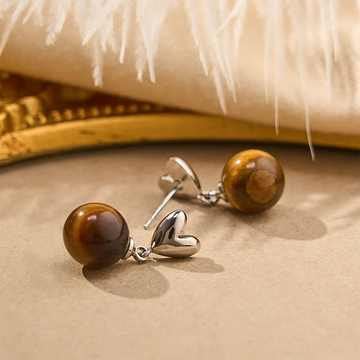 Buddha Stones Ohrringe aus Kupfer mit Tigeraugen-Herz-Design - image 2