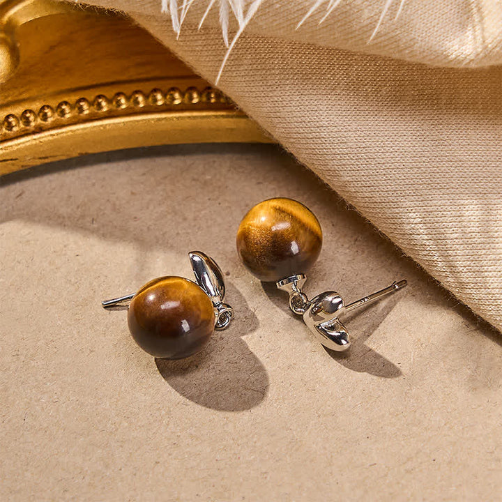 Buddha Stones Ohrringe aus Kupfer mit Tigeraugen-Herz-Design - image 1