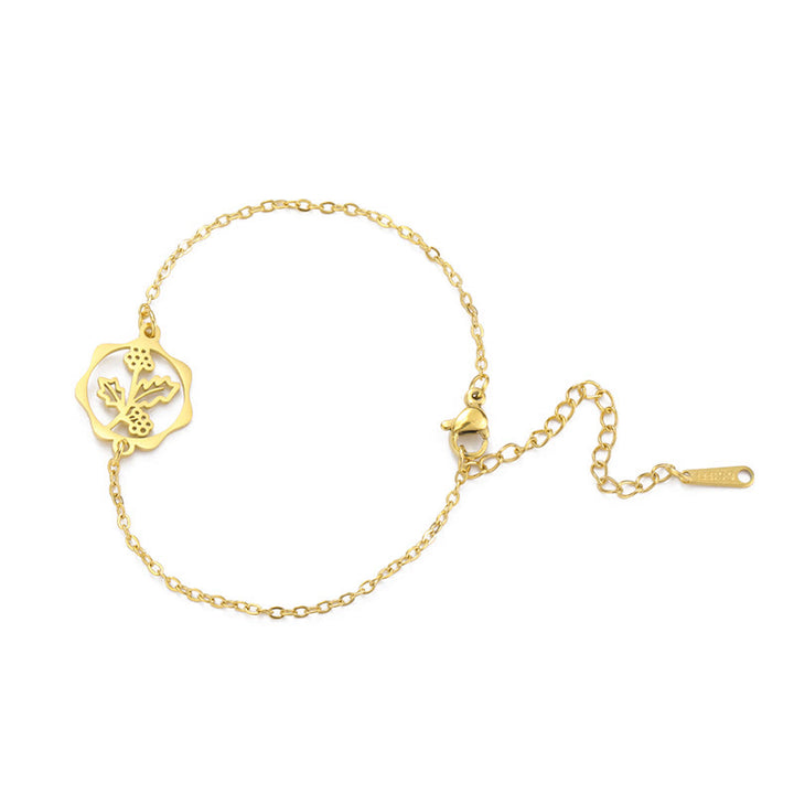 Buddha Stones Armband aus Titanstahl mit Geburtsblume für einen Neubeginn - Stechpalme - Goldener Titanstahl - image 35