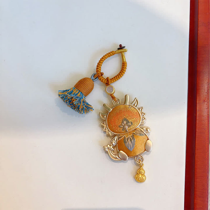 Buddha Stones Song Brocade Handgefertigter Schlüsselanhänger mit chinesischer Tierkreisquaste und Glücksbringermotiv - Drache - Gelb - image 26
