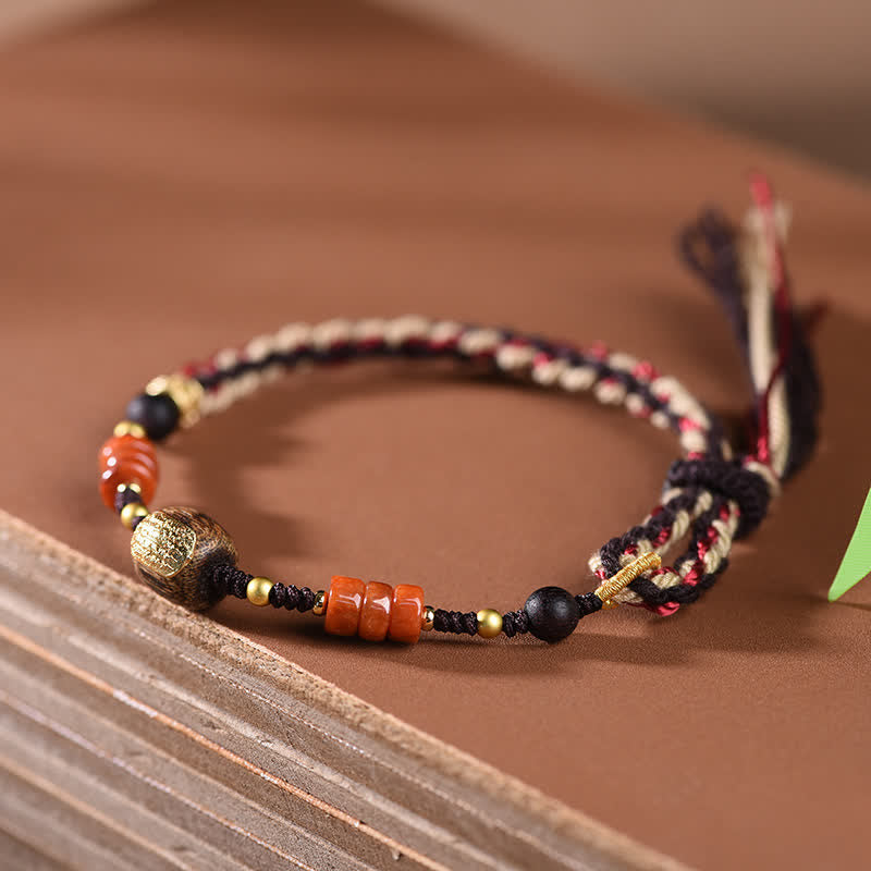 Buddha Stones Handgewebtes Armband aus rotem Sandelholz mit geflochtenen Quasten und Segensbotschaft - image 3