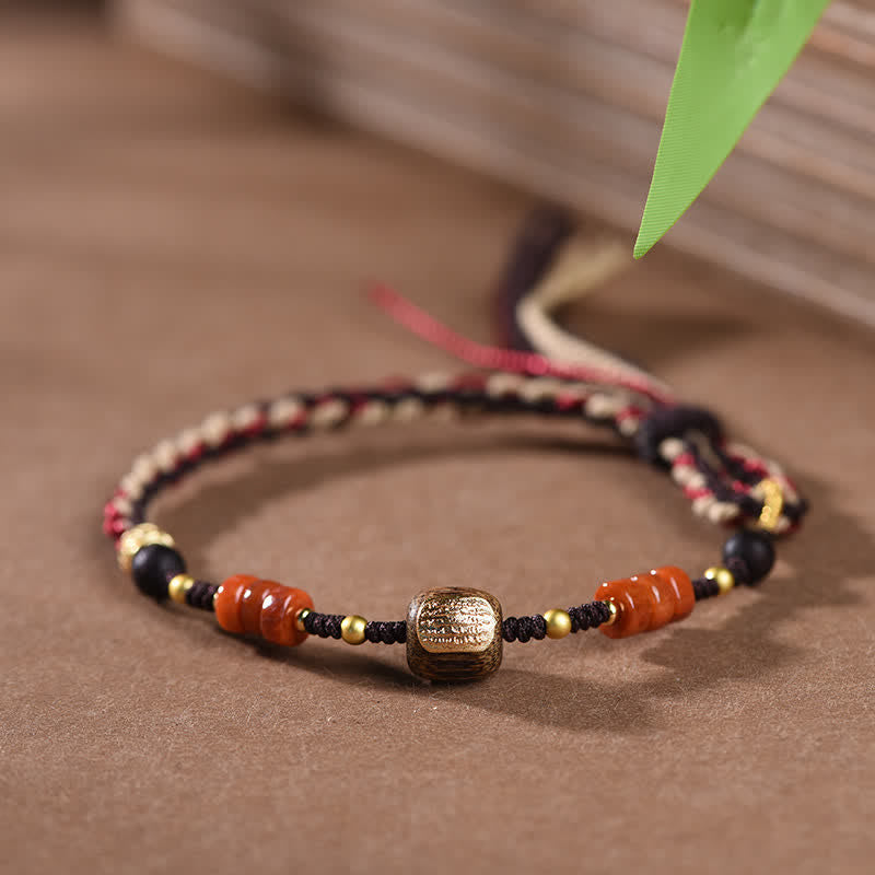 Buddha Stones Handgewebtes Armband aus rotem Sandelholz mit geflochtenen Quasten und Segensbotschaft - image 2