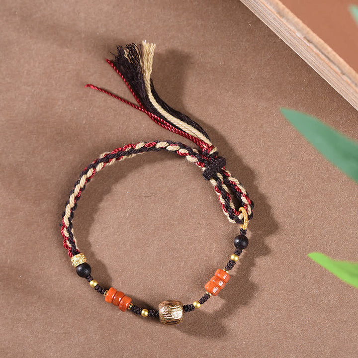Buddha Stones Handgewebtes Armband aus rotem Sandelholz mit geflochtenen Quasten und Segensbotschaft - image 4