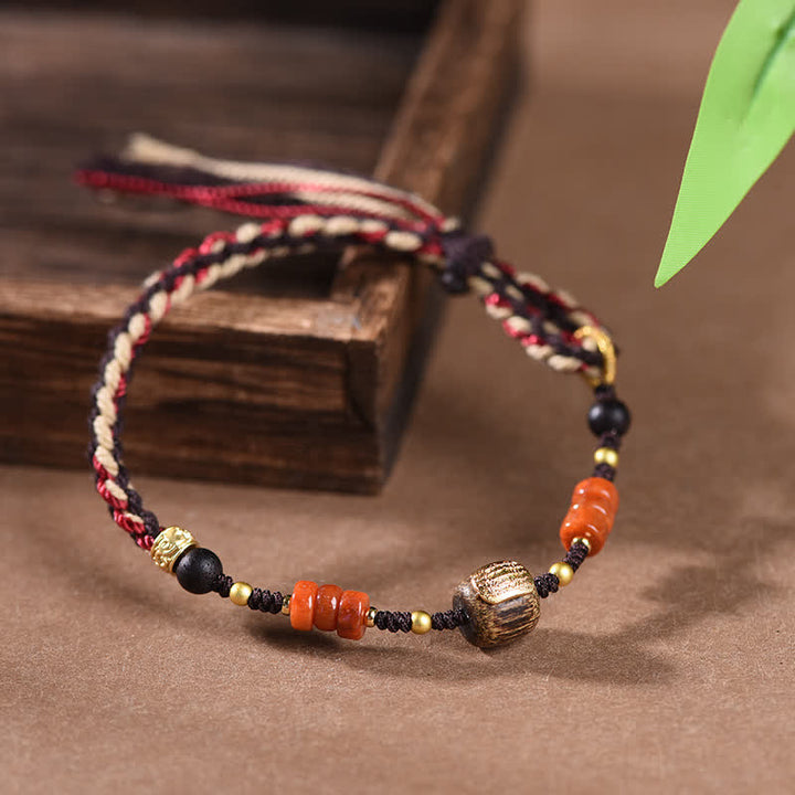 Buddha Stones Handgewebtes Armband aus rotem Sandelholz mit geflochtenen Quasten und Segensbotschaft - Roter Faden (Schutz ♥ Glück) - Rotes Sandelholz (Segen♥Glückverheißend) - image 0