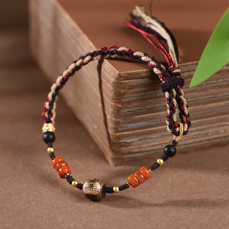 Buddha Stones Handgewebtes Armband aus rotem Sandelholz mit geflochtenen Quasten und Segensbotschaft - image 1