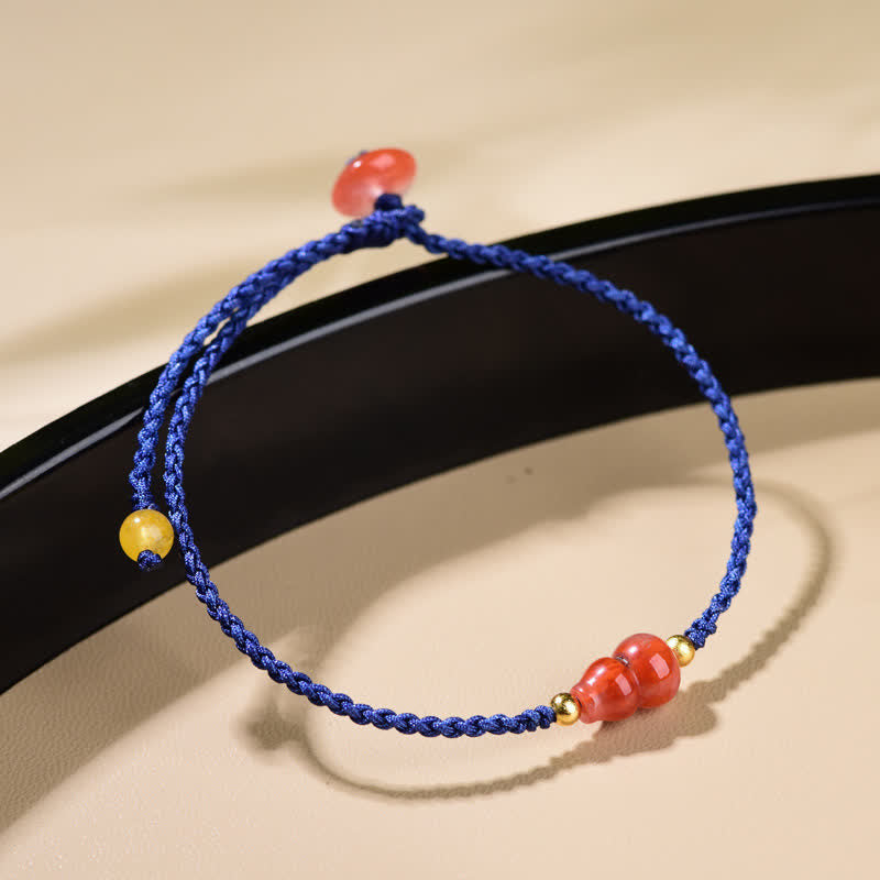 Buddha Stones Südroter Achat-Kürbis, positives handgewebtes blaues Schnurarmband - image 1