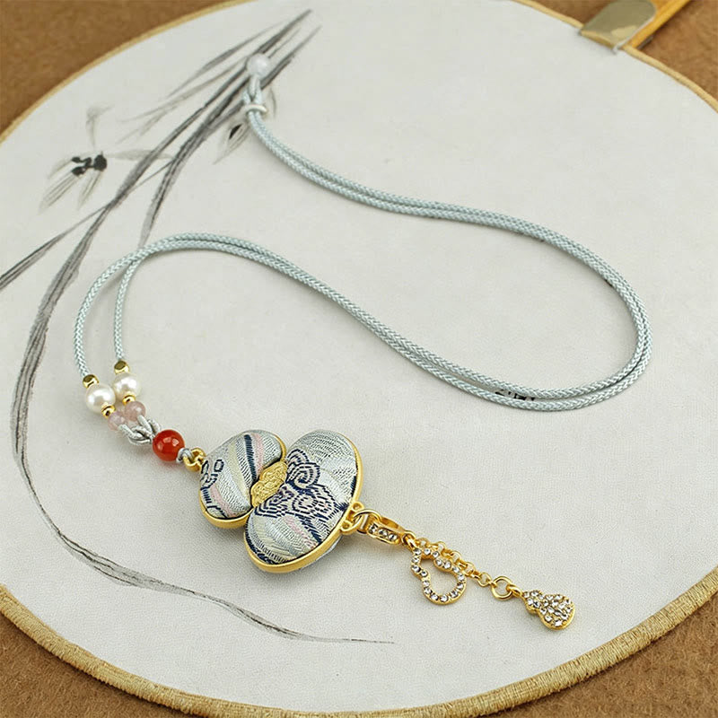 Buddha Stones Elegante Halskette aus Brokatkürbis mit Songmotiv - image 6
