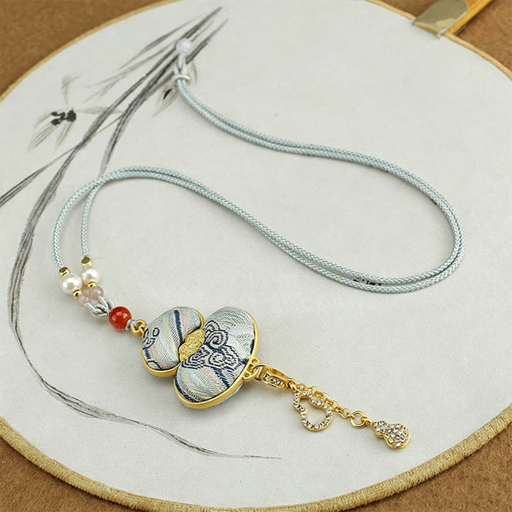 Buddha Stones Elegante Halskette aus Brokatkürbis mit Songmotiv - image 6